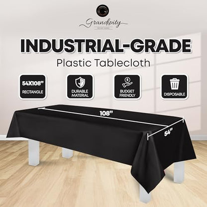 Plastic Table Cloth Disposable 12 Pack 54” x 108” Rectangle | Black Plastic table covers, durable disposable tablecloths, fade and tear-resistent table cover for party, event - color: Black, size: 54in. x 108in. Rectangle