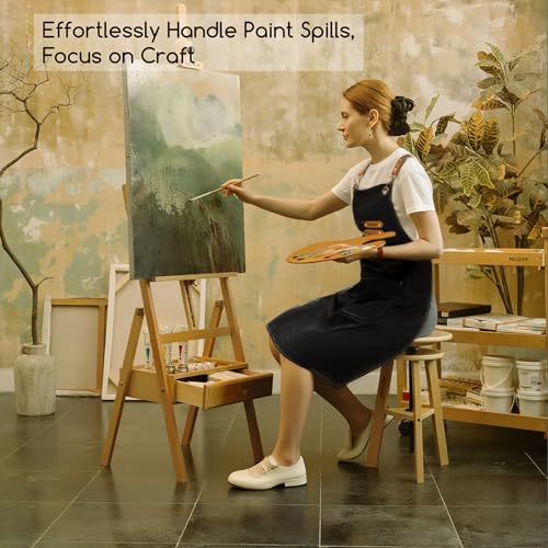 MEEDEN Painting Apron for Men Women: Adjustable Cross Back Waterproof | Polyester Canvas Art Apron with 3 Pockets - Artist Apron for Acrylic Oil & Watercolor Painting, Gardening, Cooking - Black - color: Black