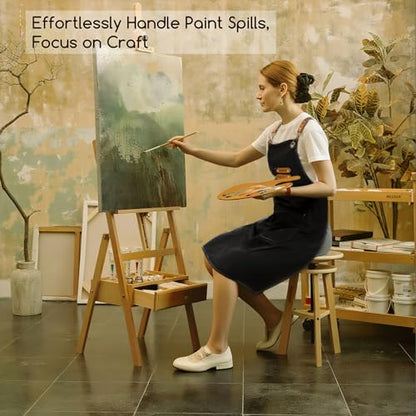 MEEDEN Painting Apron for Men Women: Adjustable Cross Back Waterproof | Polyester Canvas Art Apron with 3 Pockets - Artist Apron for Acrylic Oil & Watercolor Painting, Gardening, Cooking - Black - color: Black