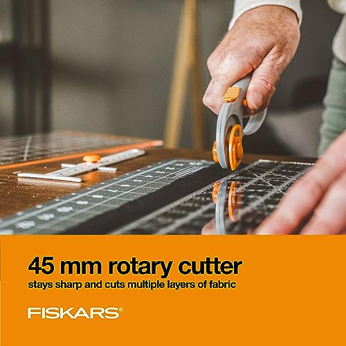 Fiskars 3-Piece Fabric Cutting Set, Rotary Cutter, Cutting Mat & Ruler | 45mm Ergonomic Loop Rotary Cutter w/ Blade, Sewing Ruler to Cut Directly from the Bolt, Folding Cutting Mat for Easy Storage