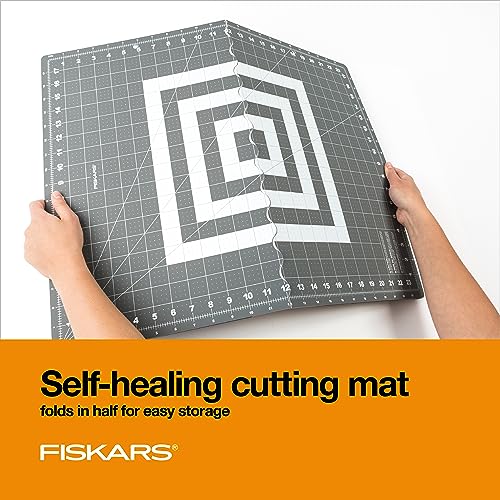 Fiskars 3-Piece Fabric Cutting Set, Rotary Cutter, Cutting Mat & Ruler | 45mm Ergonomic Loop Rotary Cutter w/ Blade, Sewing Ruler to Cut Directly from the Bolt, Folding Cutting Mat for Easy Storage