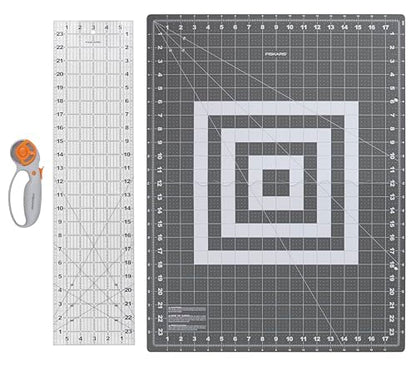 Fiskars 3-Piece Fabric Cutting Set, Rotary Cutter, Cutting Mat & Ruler | 45mm Ergonomic Loop Rotary Cutter w/ Blade, Sewing Ruler to Cut Directly from the Bolt, Folding Cutting Mat for Easy Storage